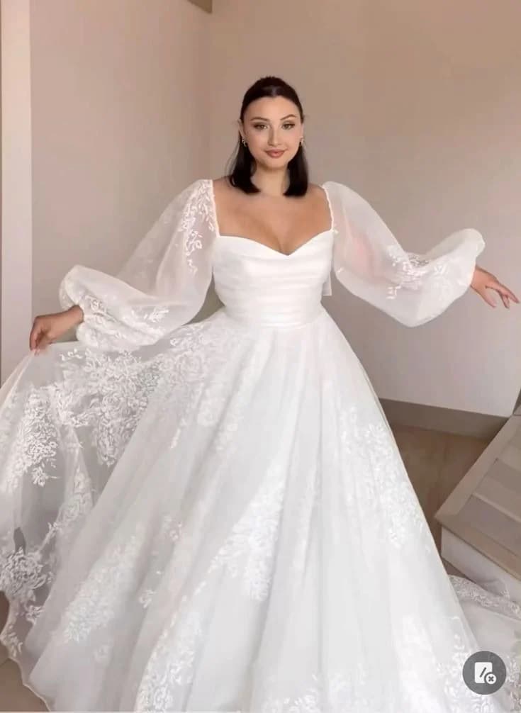 Elegant Ball Gown with Sheer Embellished Cape